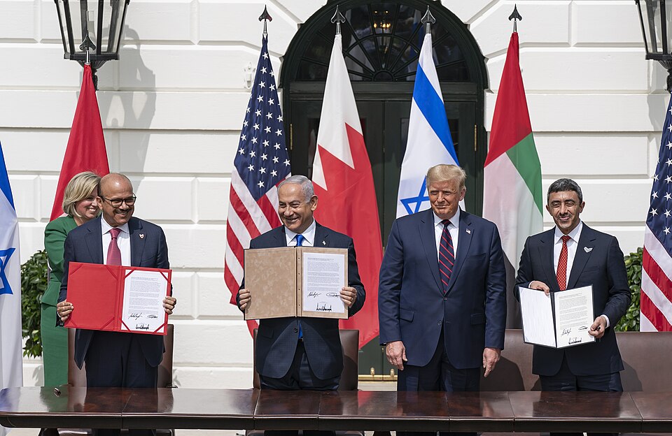 Trump signs Iran accord amid unresolved nuclear questions